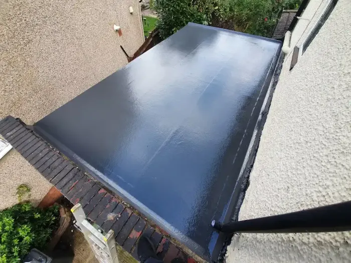 New grey GRP fibreglass flat roof on a house extension